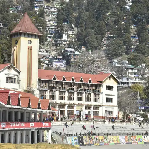 Nainital Clock Tower and Mall Road area with hillside houses in the background
